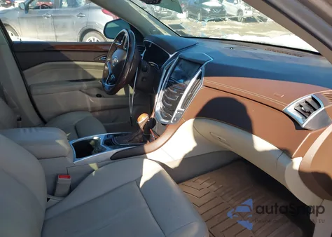 2014 Cadillac Srx Luxury Collection z USA, uszkodzony, nr VIN 3GYFNBE30ES573825